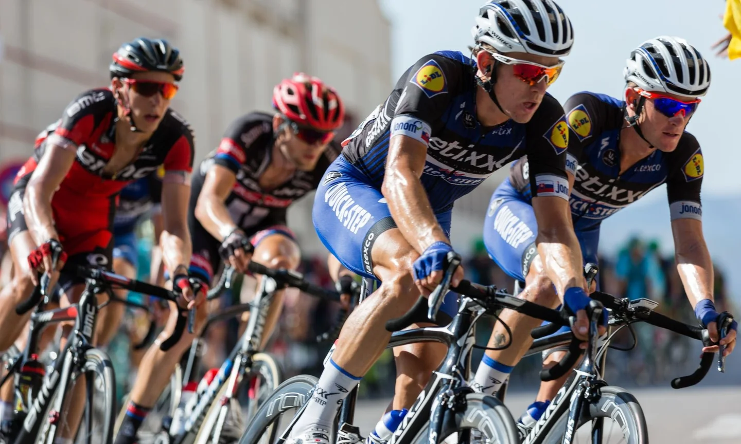 Cyclists riding together in a road race